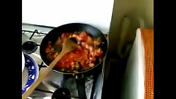 Indian Housewife Enjoying Intimate Moments In The Kitchen