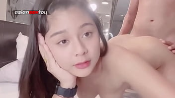 Young Asian Girl With An Adorable Grin Enjoys Doggy Style Pleasure